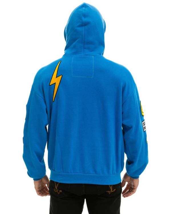 And Just Like That Alexa Swinton Blue Patch Hoodie