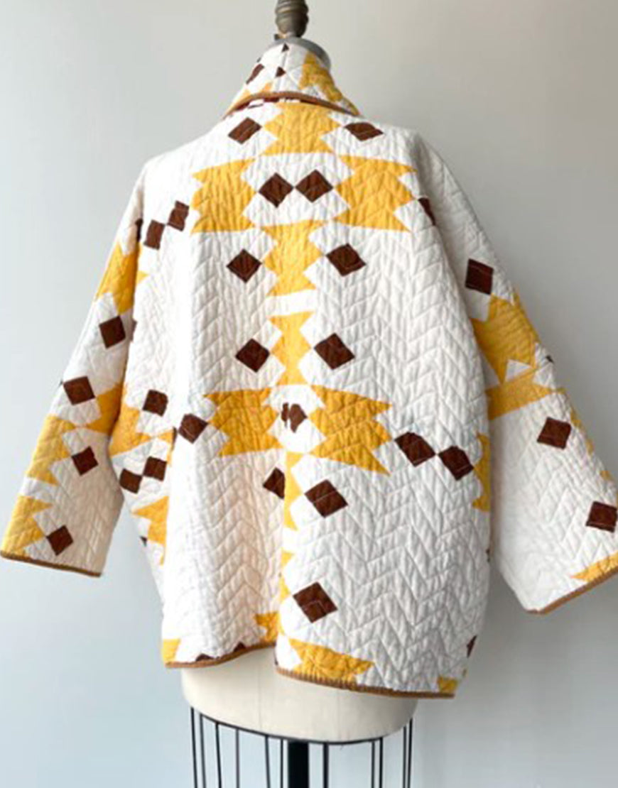 The Parenting 2025 Parker Posey Quilted Coat
