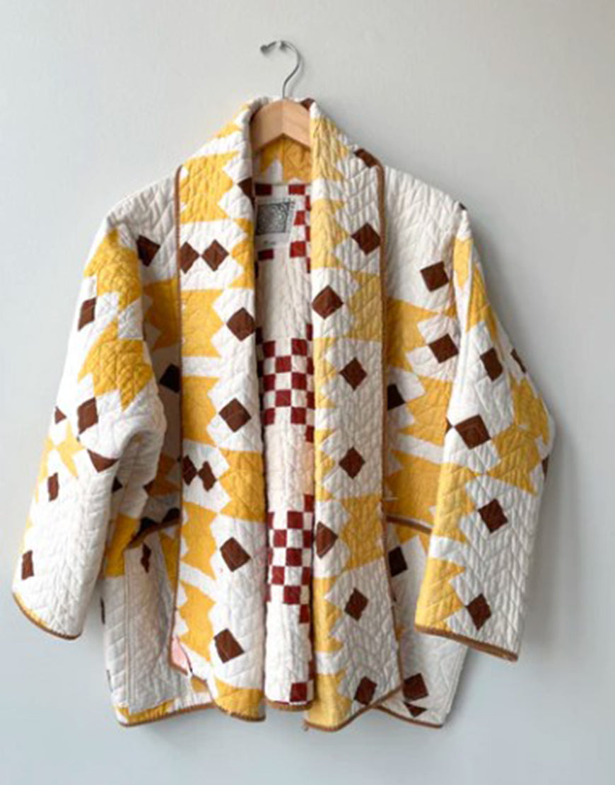 The Parenting 2025 Parker Posey Quilted Coat