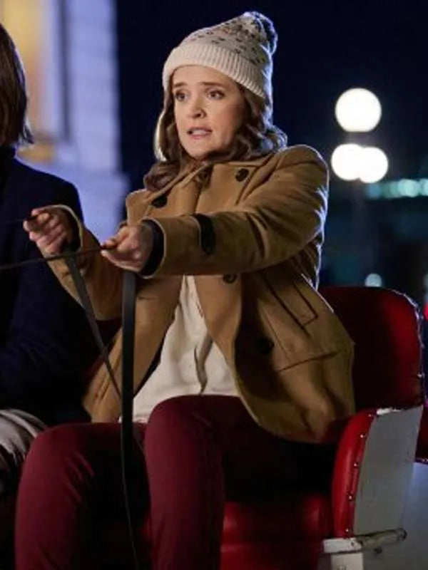 JessBrownSantaTellMe2024BrownJacket