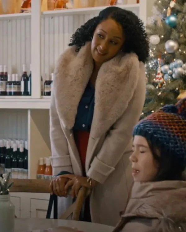 Tamera Mowry-housley Scouting For Christmas Shearling Coat